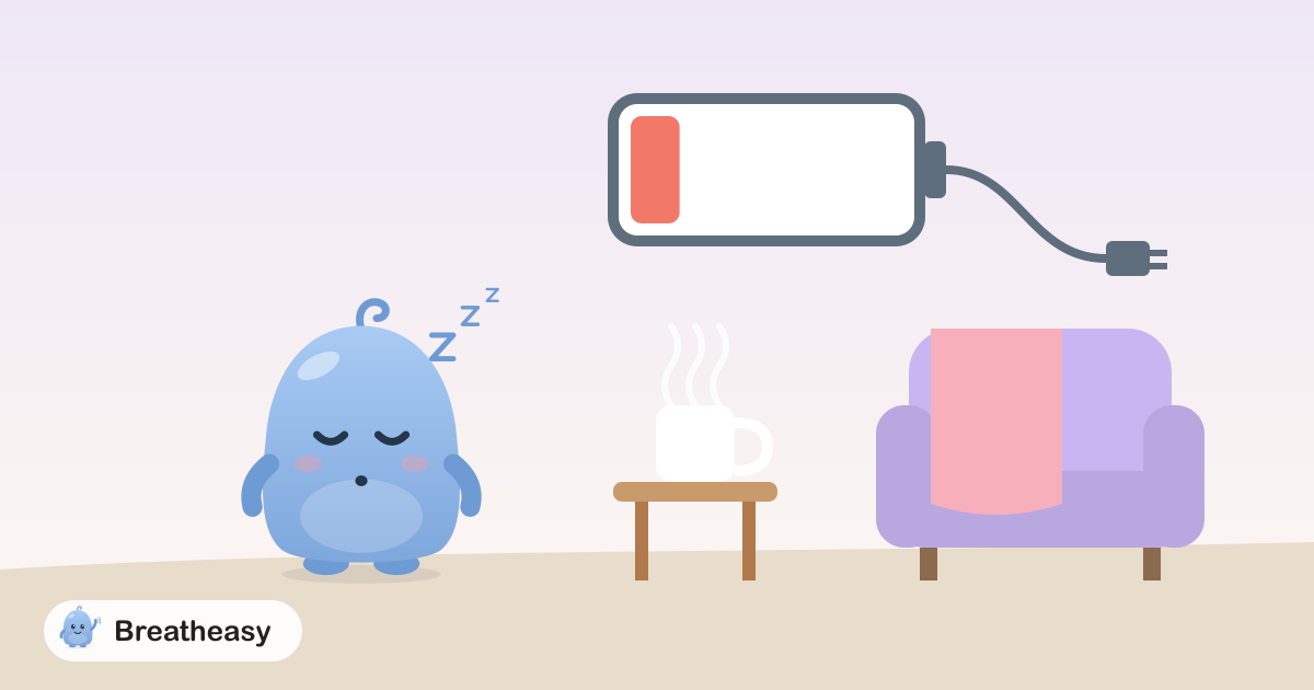 A sleepy Luma next to a big battery on low charge with its plug, a cup of tea and an armchair with a soft blanket.